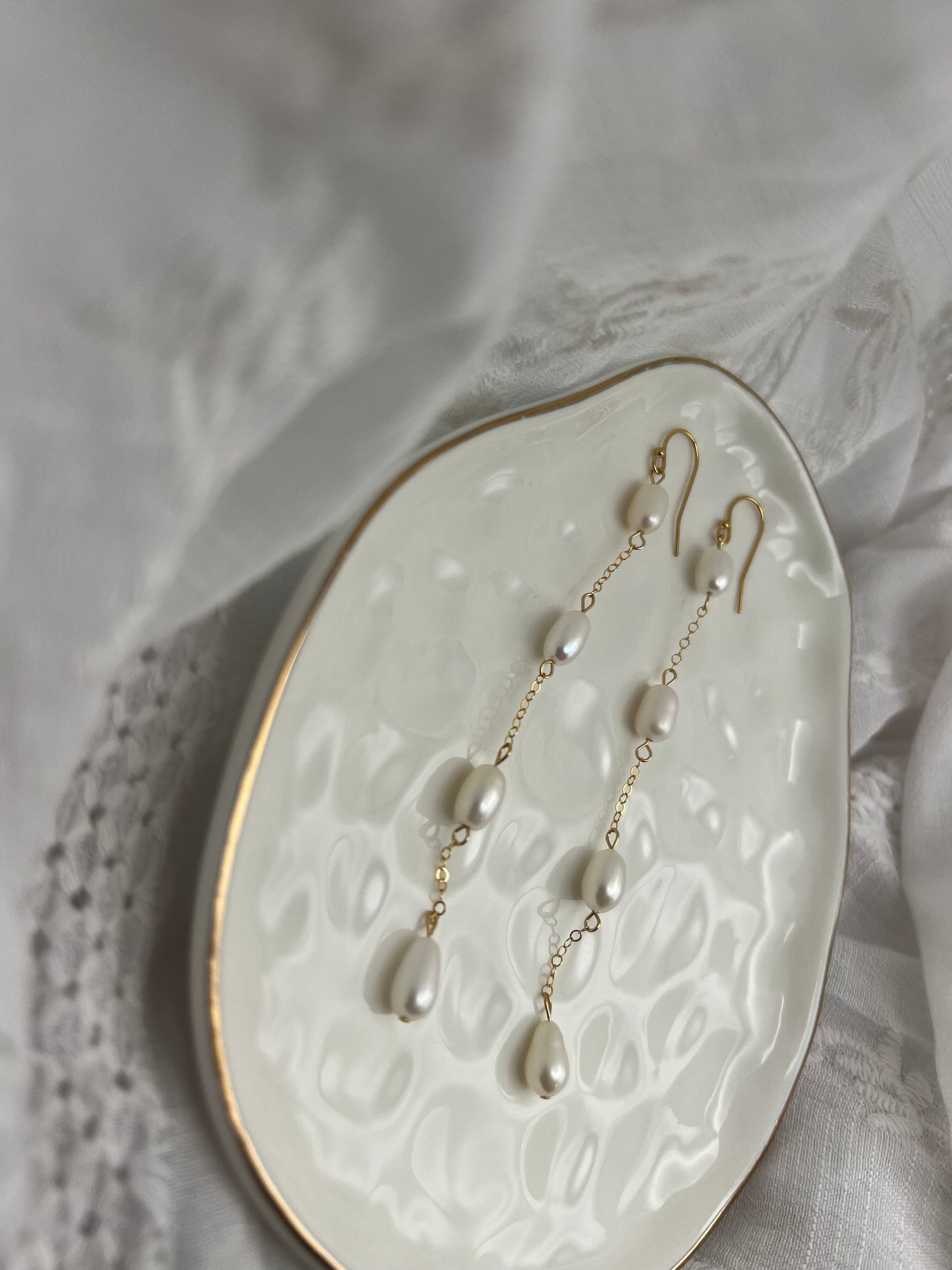 Four Pearl Earrings