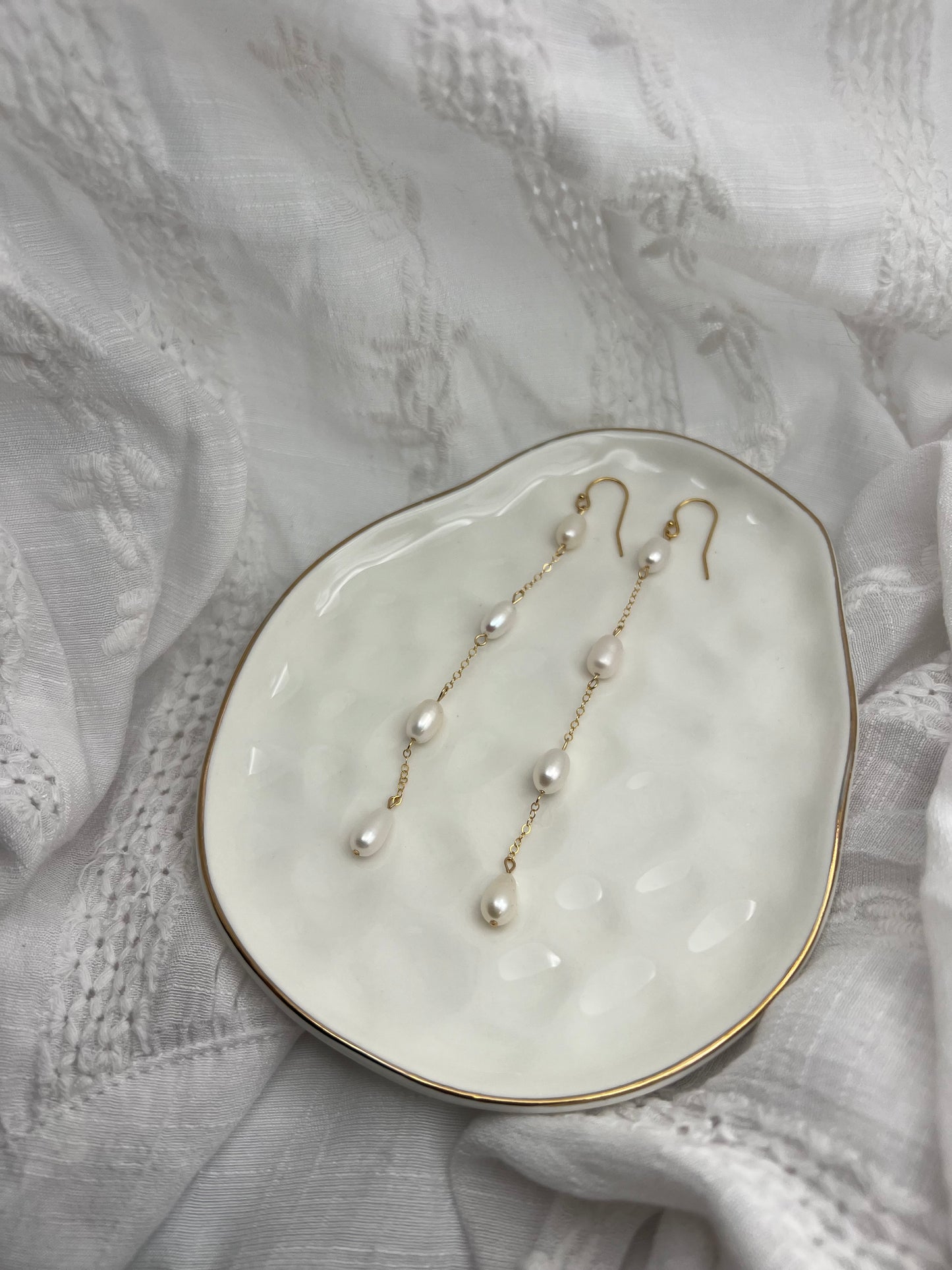 Four Pearl Earrings